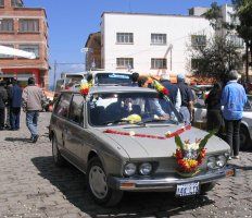 Cars waited to be blessed outside the Church, Copacabana, Bolivia