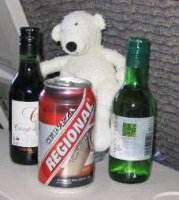 Paddy drinking beer on the plane